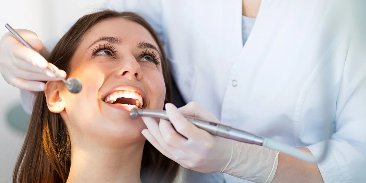 Dental treatment of a smiling patient