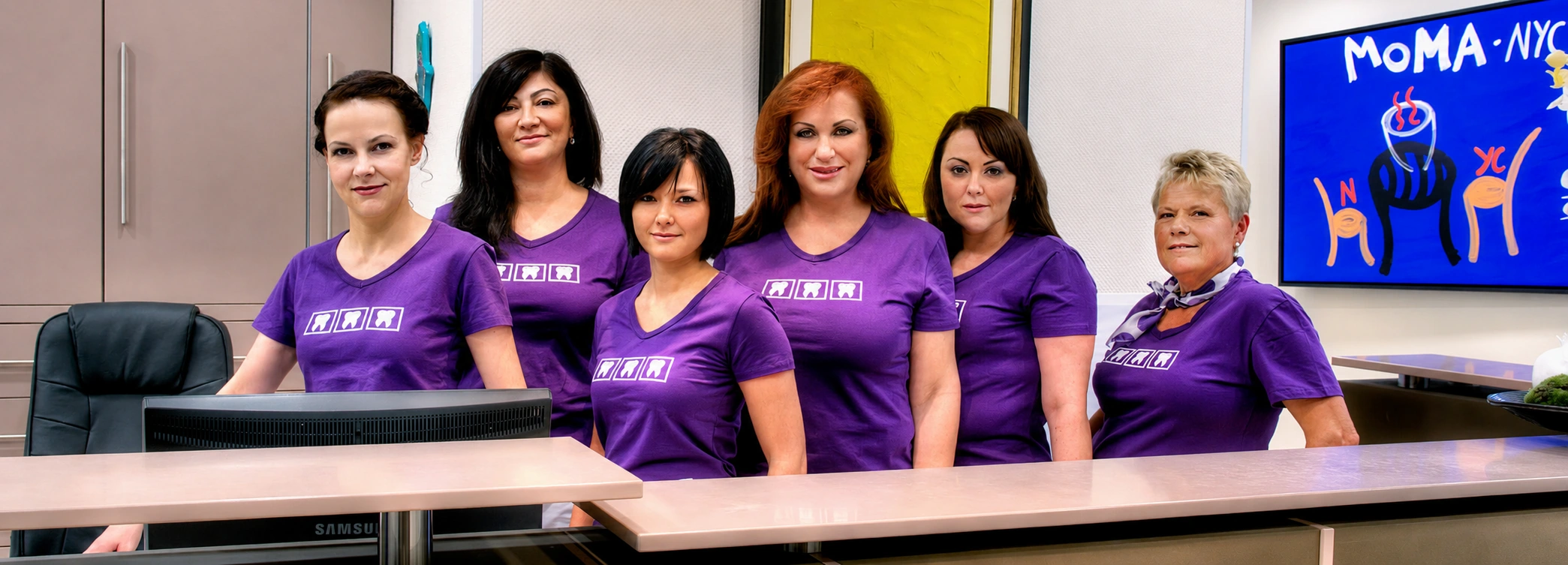 The team of the Rita Goutkin dental practice at the reception desk